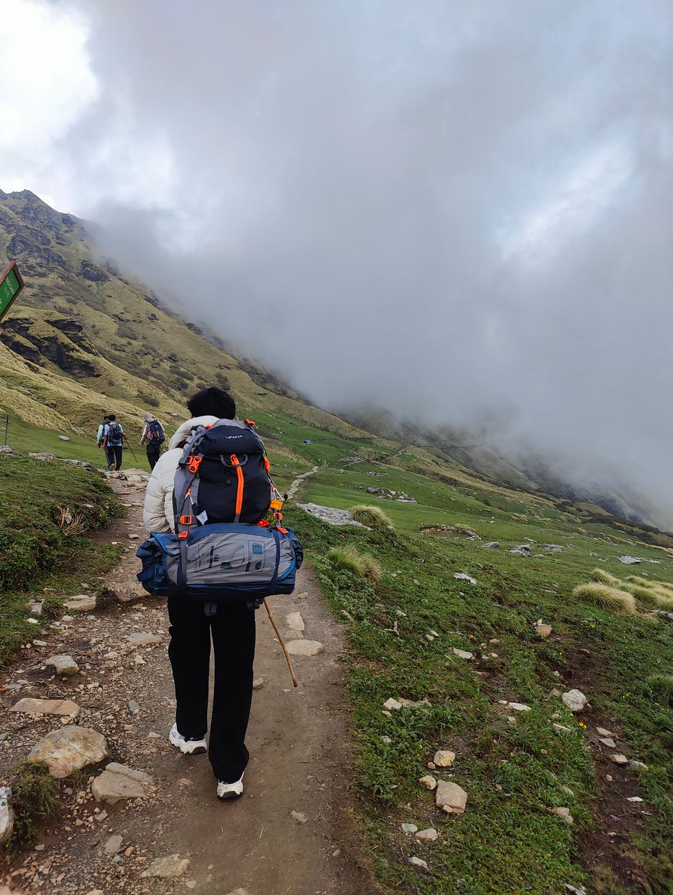 Hiker looking across mountain ridges